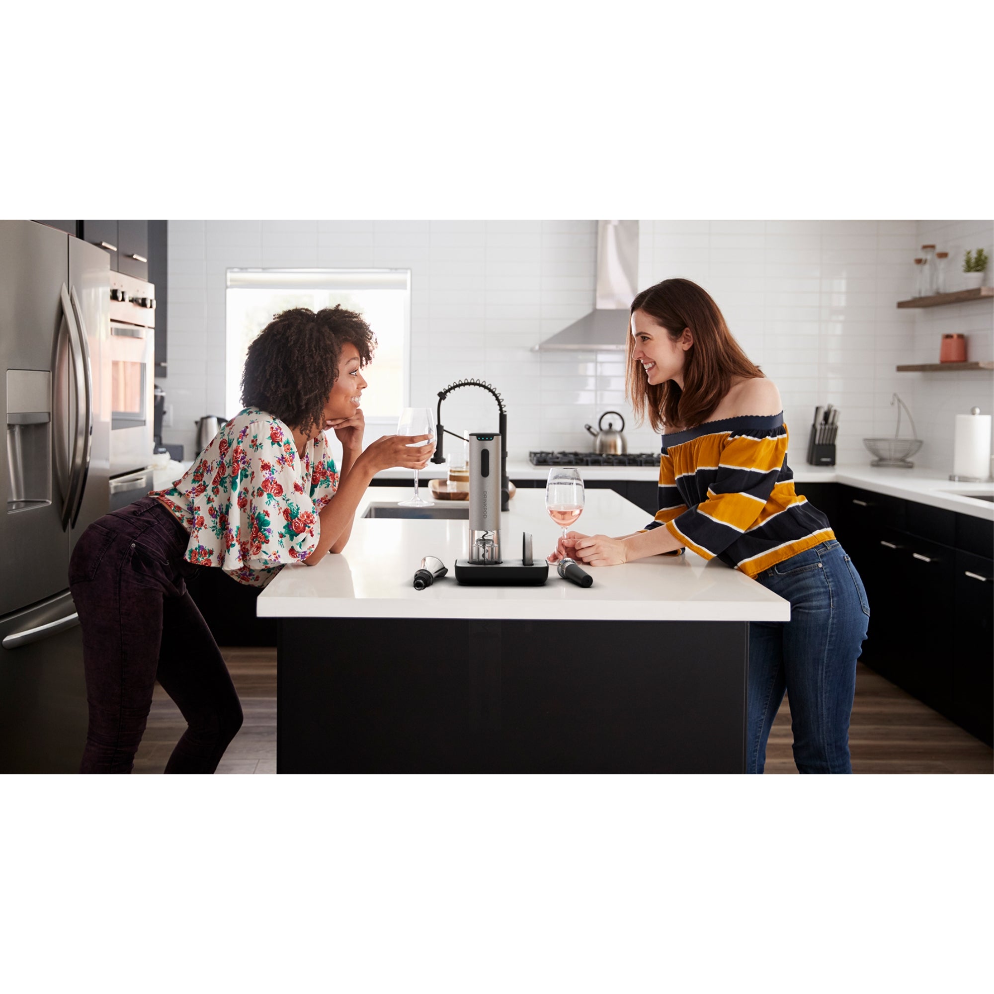 WineKEY Electric Wine Bottle Opener set including opener, charging base, foil cutter, wine pourer, and vacuum stopper in a stylish arrangement.